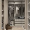 assorted clothes hanged inside cabinet